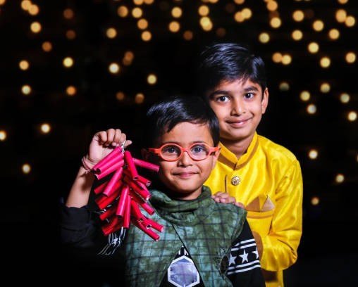 Two boys with Diwali fireworks